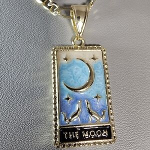 Gold Tone and Blue Moon Pendant Necklace
